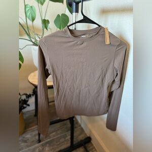 Skims Oxide, fits everybody tee. M